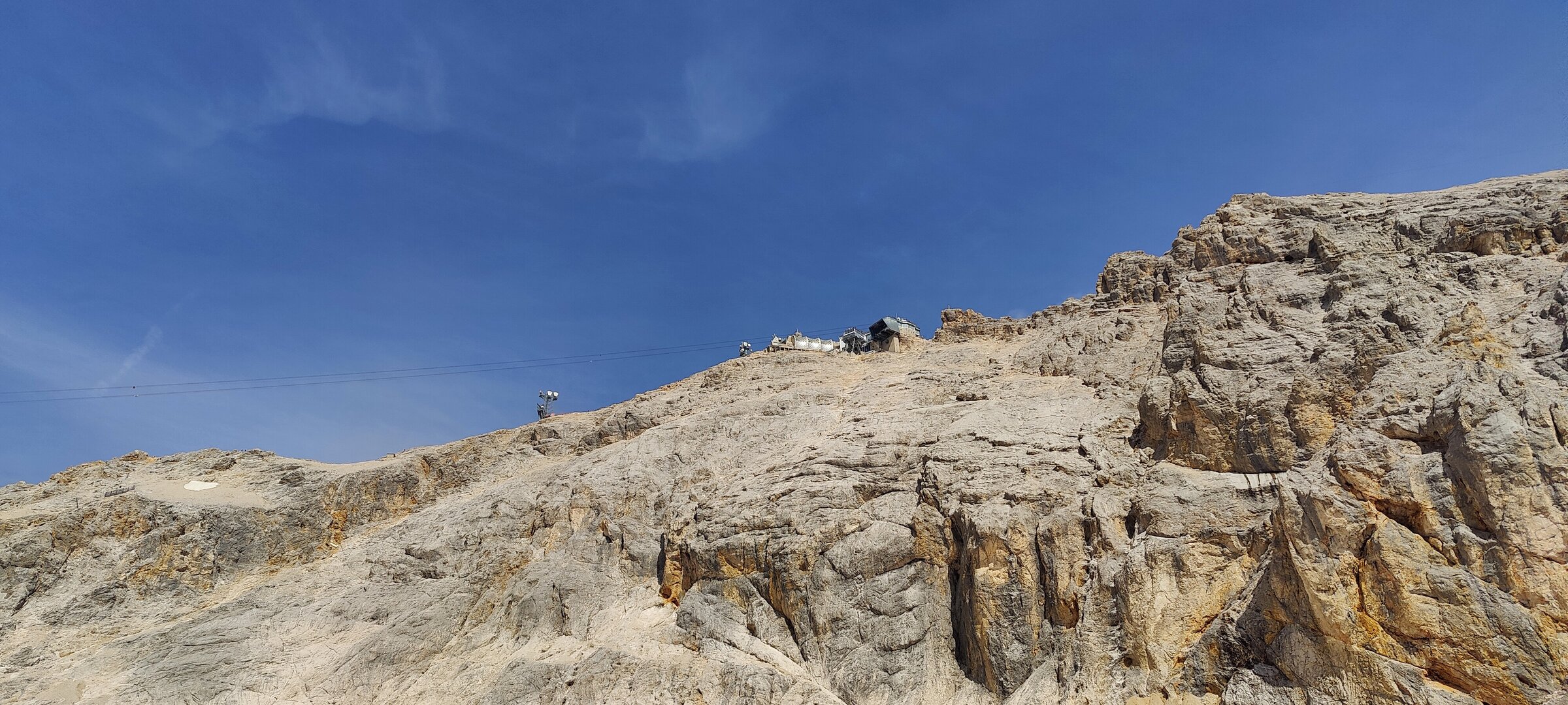 The steep rocky ascent — every step hard-won on the loose scree